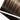 Detailansicht der Genius Wefts Tresse in Luis Velvet Brown mit Tape-Streifen – Rubin Extensions®