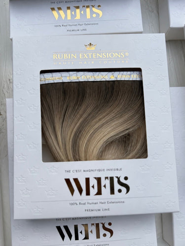 Genius Wefts in Smokey-Ash in der WEFTS Verpackung – Rubin Extensions®