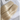 Cut-out Platinum Blonde tape-in human hair strands on a white background – Rubin Extensions®