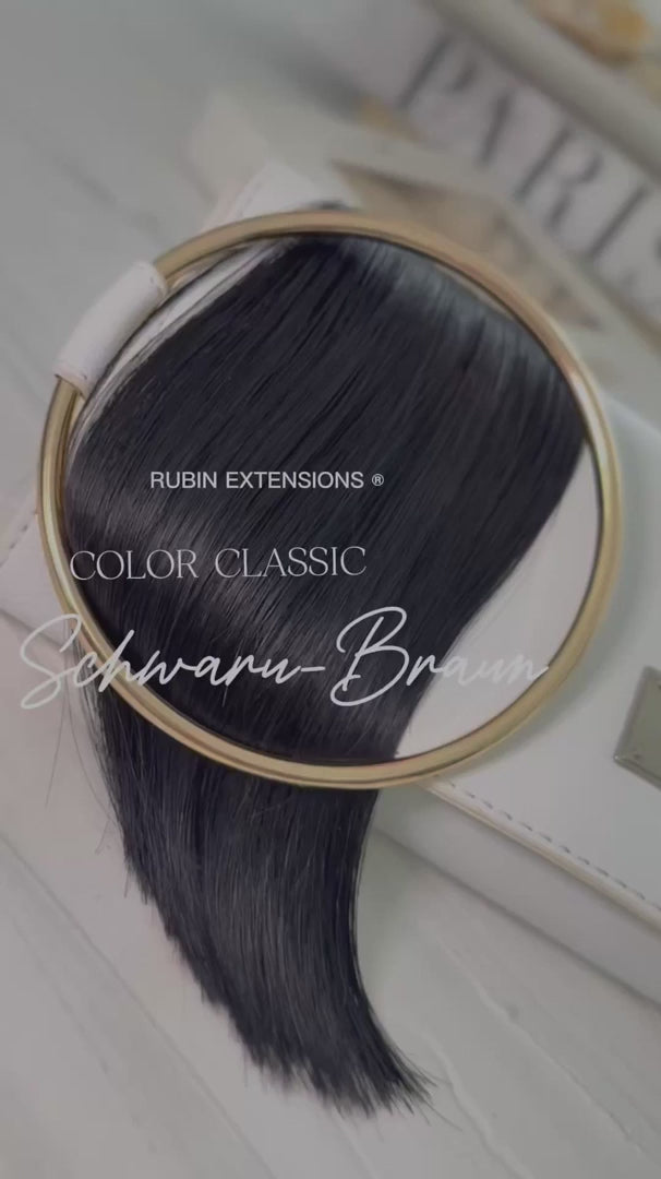 Human hair color sample in Black-Brown